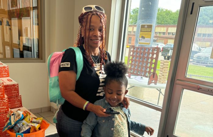  Parent in child at back to school event